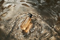 Body wash bottle pump water cosmetics outdoors.