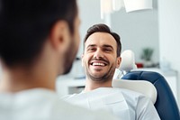 Man smiling while teeth exam dentist happy male.