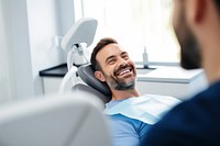 Man smiling while teeth exam dentist male person.