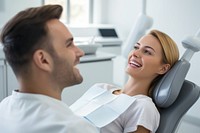 Women smiling while teeth exam dentist happy male.