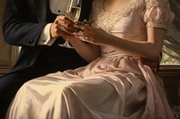 Hand holding champagne bottle clothing apparel fashion.