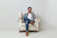 Happy man sitting on the armchair furniture footwear portrait.