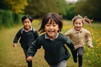 Asian pupils chasing person female.