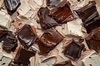Oil painting of a close up on pale chocolate confectionery backgrounds dessert.