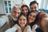 Multigenerational people selfie laughing family.