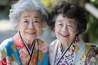 Smilling 2 friends senior women in yukata portrait adult photo.