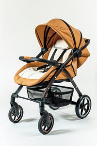 A modern baby stroller vehicle wheel white background.