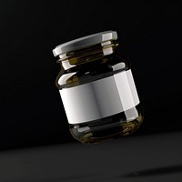 Clear jam jar bottle with white label glass black background container.
