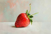 Close up on pale strawberry painting fruit plant.