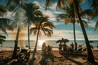 People party with BBQ grilling beach tree shoreline.