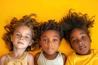 3 inclusivity kid portrait yellow child.