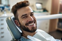 Man smiling while doing teeth exam adult smile happy.