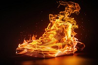 Shoes fire flame bonfire black background illuminated.