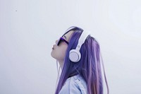 Teenage woman wear headphone headphones purple portrait.