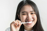 Teenage woman brush teeth toothbrush portrait smile.