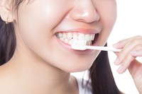 Teenage woman brush teeth toothbrush portrait smile.