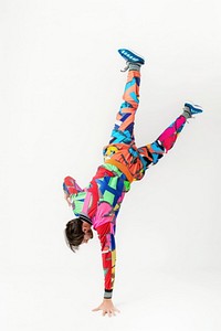 Teenage man handstand acrobatics white background flexibility.