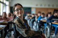 Girl on a wheel chair student glasses adult.
