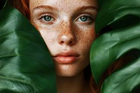 Girl with freckles posing green skin hairstyle.