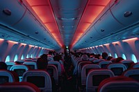 The rows and seats of an airplane full of people aircraft vehicle adult.