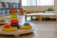 Toys and educational equipment in a childcare center kindergarten furniture indoors.