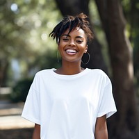 Black woman wearing white over size t-shirt happy clothing apparel.