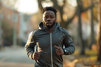 African american man running wristwatch jogging.