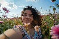 Middle eastern woman flower summer selfie.