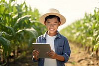 Thai young farmer happy photo electronics.