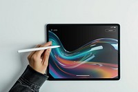 Woman using stylus with tablet flat layt