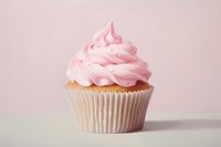 Close up on pale pink cupcake dessert cream creme.