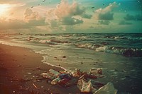 Waste trash on the beach pollution outdoors horizon.