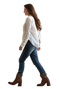 Full body shot of a woman walking jeans boot clothing.