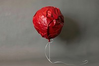 Balloon in style of crumpled paper art.