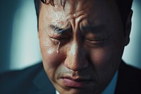 Korean businessman crying worried person.