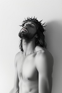 A Jesus wearing crown of thorns photography portrait white.