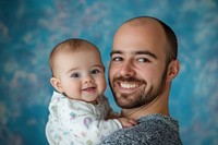 Daddy and baby hugging each other smile background photo.