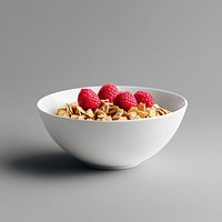 An isolated cereal with raspberry in a clean white bowl raspberries food background.