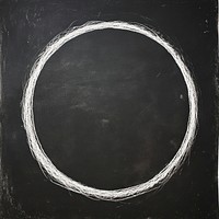 A white dot symbol blackboard texture drawing.