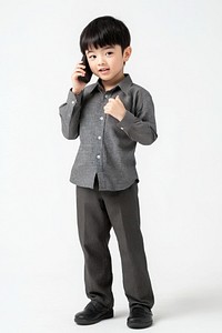 6-year-old Asian boy standing shirt talking.