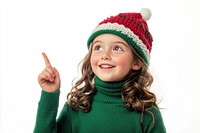 Kid in a green turtleneck hat background pointing.