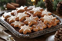 Rustic homemade cookies served on a decorative platter gingerbread star-shaped desserts.