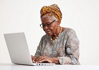 African senior woman working laptop computer clothing.