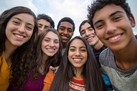 Group of diverse young adults happy outdoors friends.