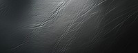 Black leather textured background material elegant luxury.