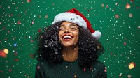 Happy woman celebrating Christmas hat background christmas.