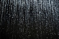 Black rain falling texture background effect.