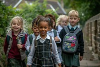 Young children walking together photography backpacks outdoors.