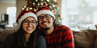 Christmas native american couple happy hats portrait.