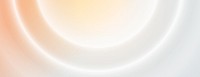 Soft gradient background with orange and white hues. The background features smooth, circular patterns in orange and white tones. Gradient neon background vector. Orange background.